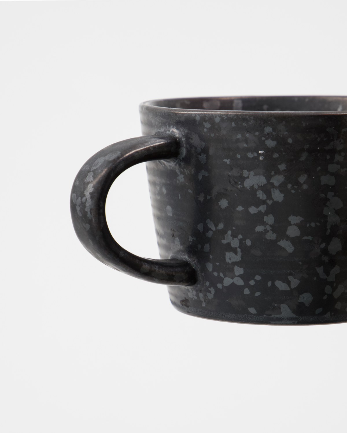 Pion cup and saucer - black - by House Doctor