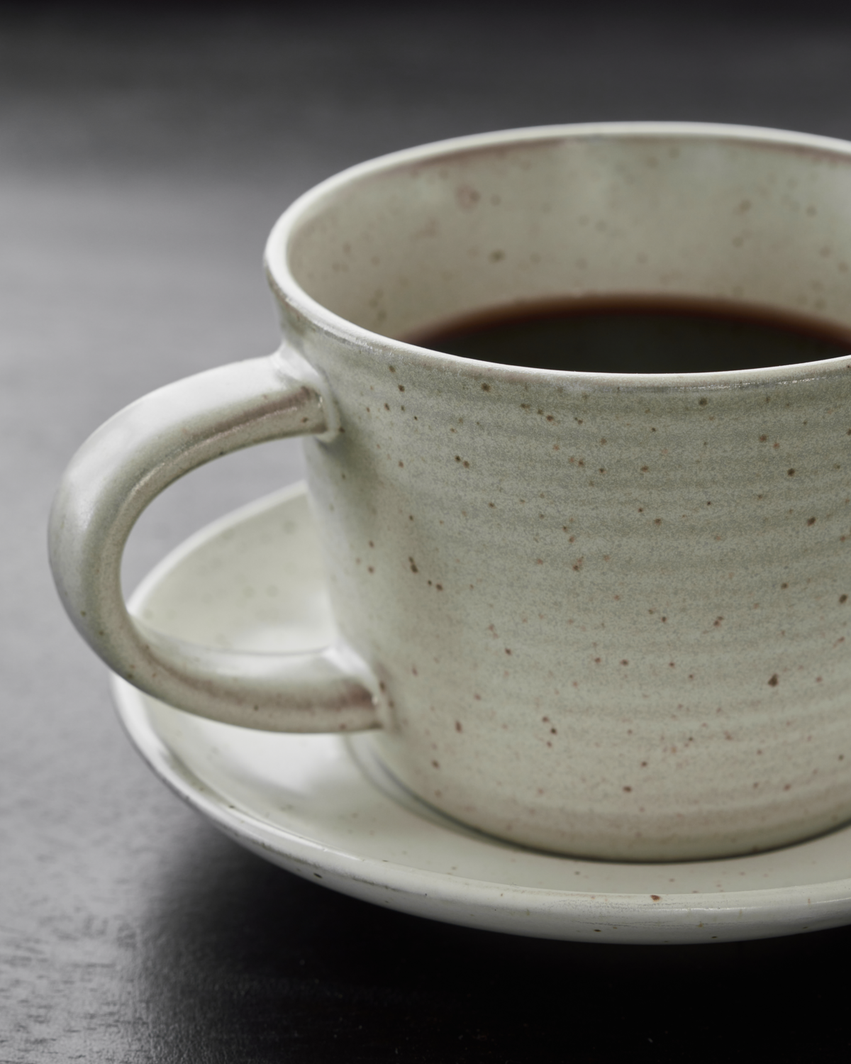 'Pion' cup and saucer - off white - by house doctor