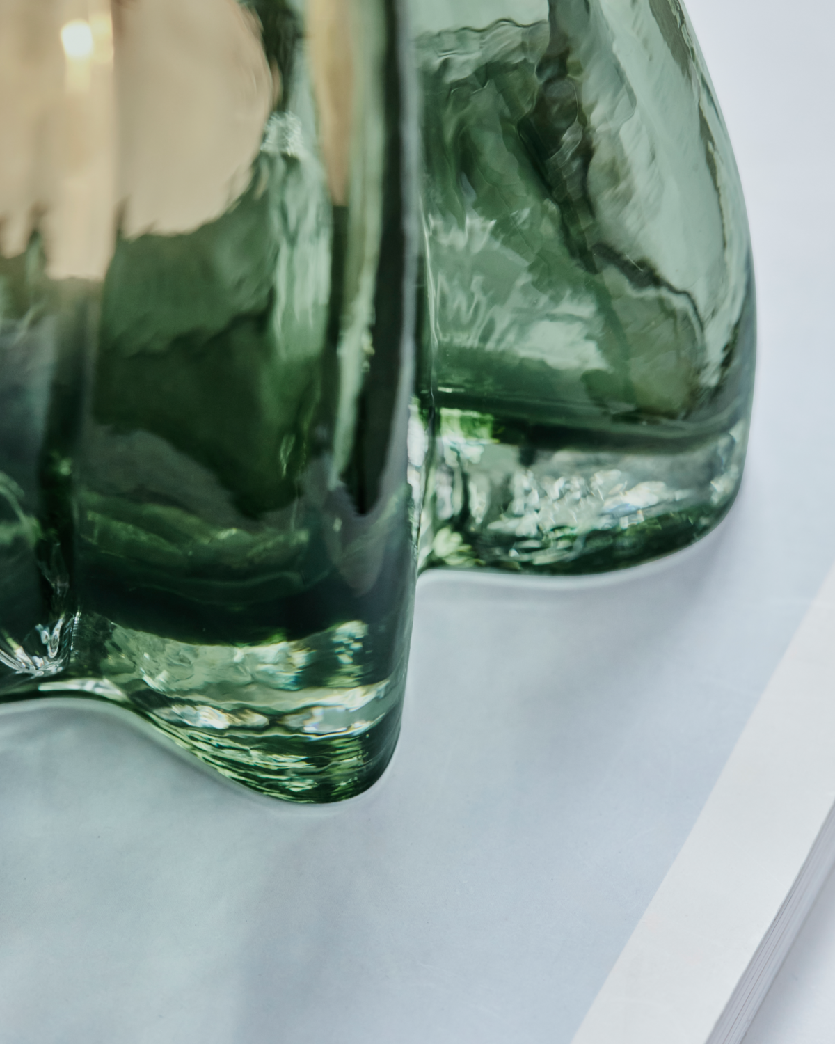 'Curva' glass tea light holder - green - by House Doctor